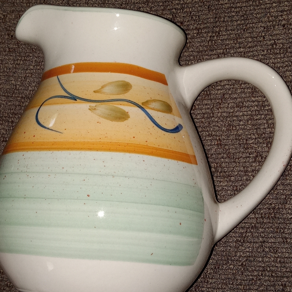 Milk Pitcher made of porcelain marked WCL